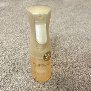 Kopari Beach-Ready SPF Mist in Cream and Gold